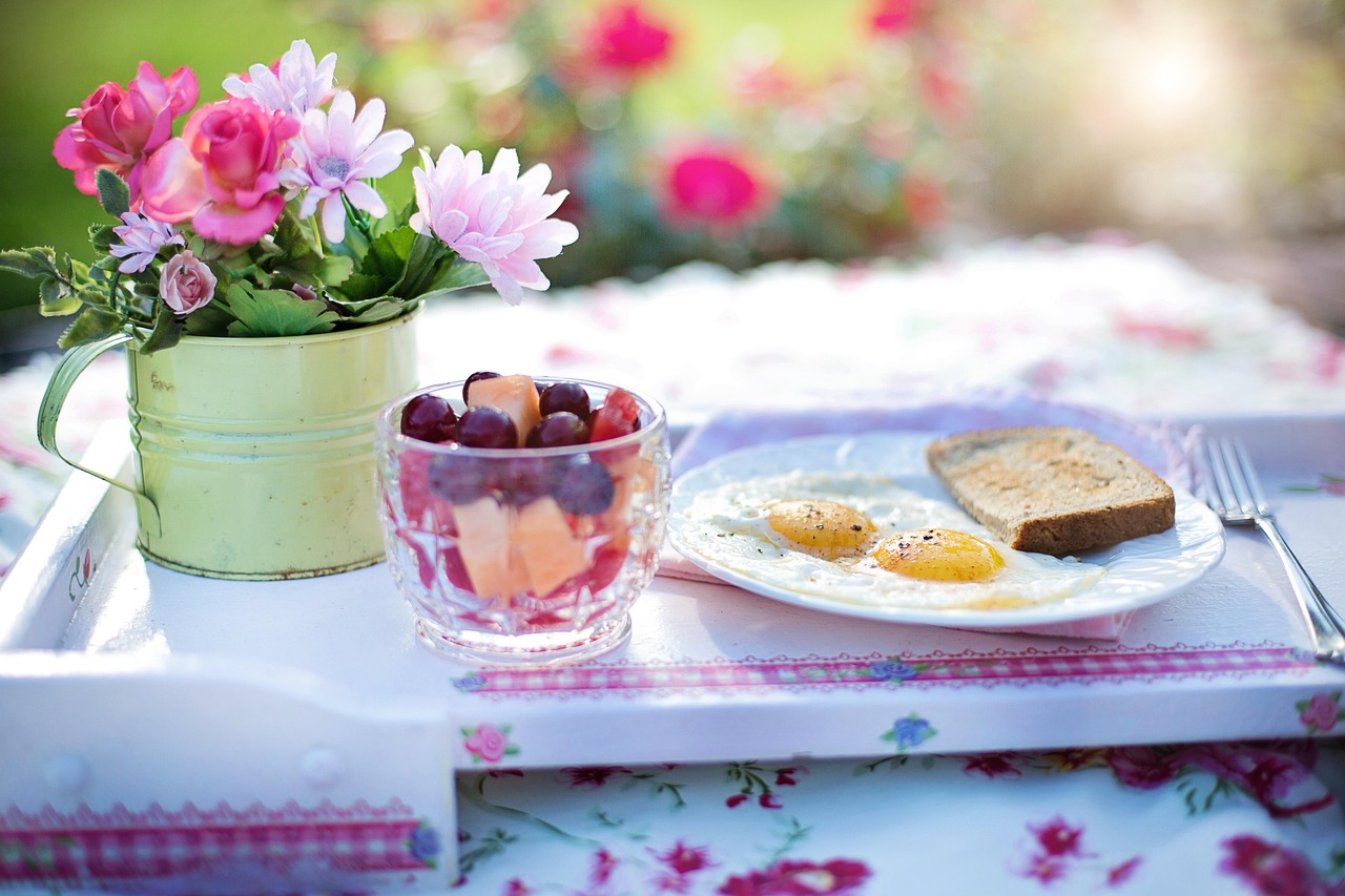 A plated breakfast of eggs and toast, representing the adequate protein intake needed to support muscle retention