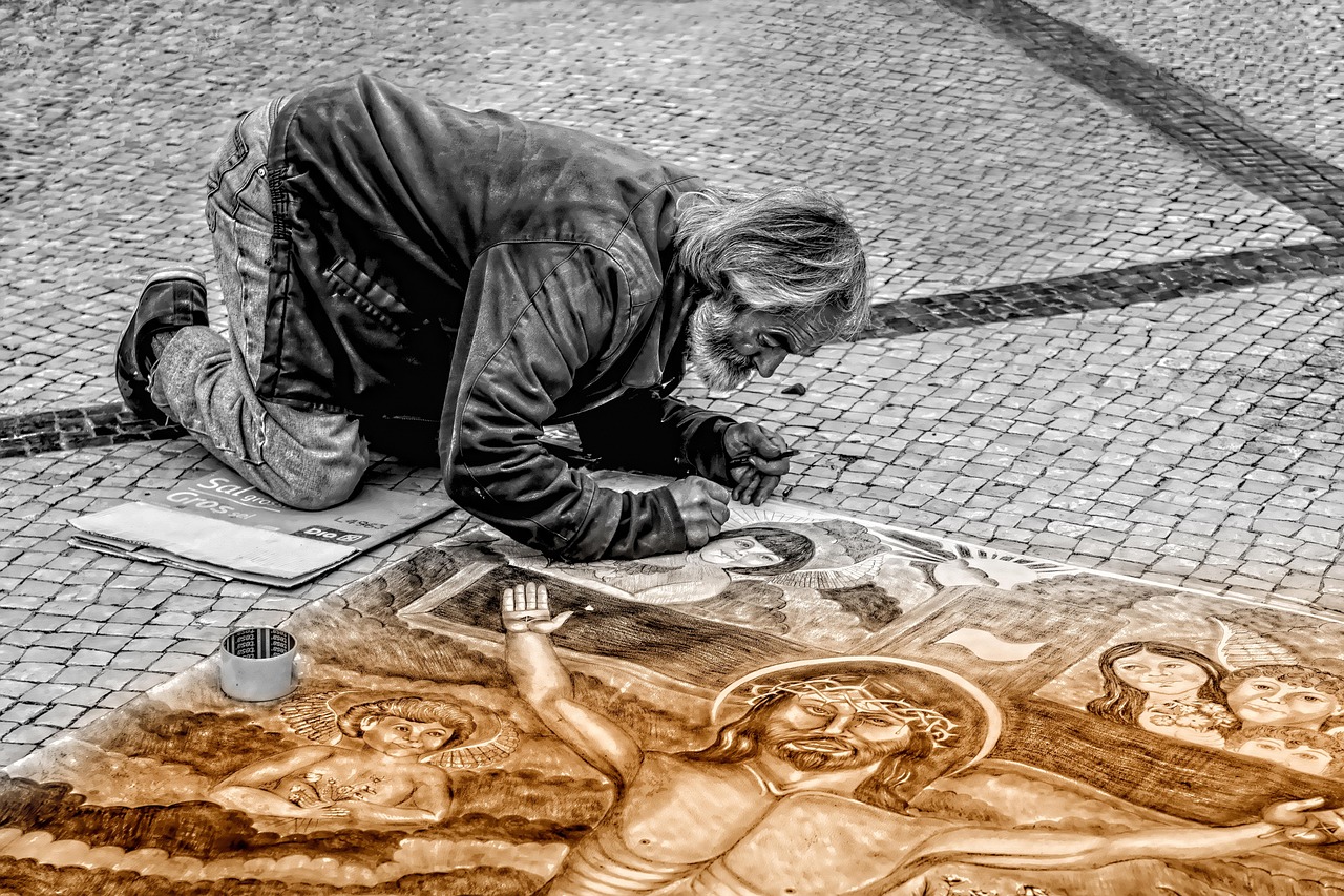 Man, artist, street — illustrating CoQ10 and Aging: What the Evidence Shows