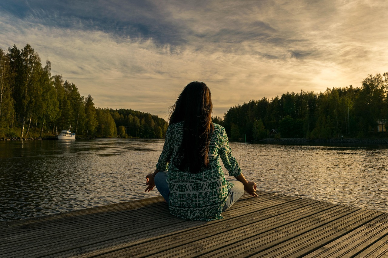 Yoga, woman, lake — illustrating Creatine for Brain and Cognitive Aging