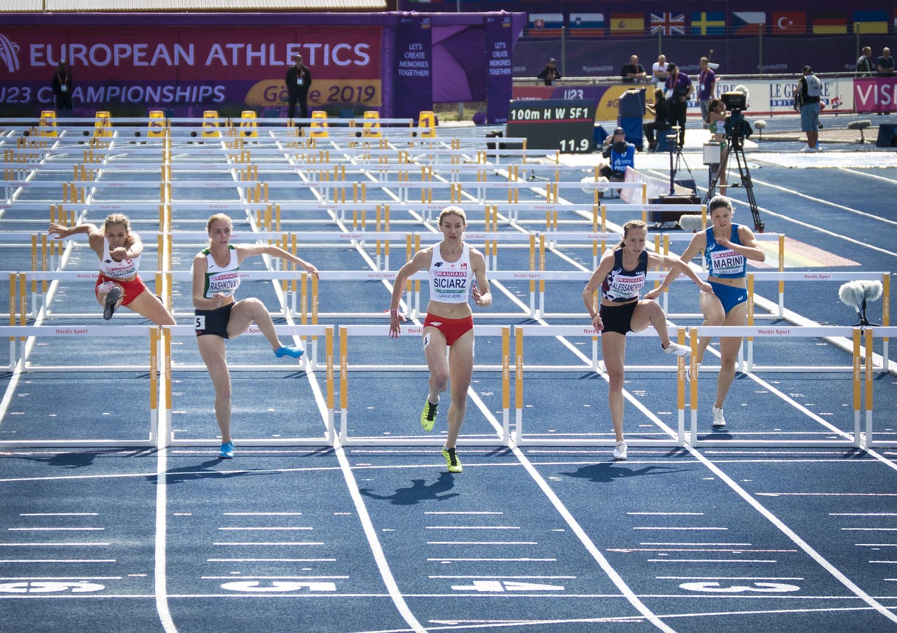 Running, hurdles, athletics — illustrating Does Cold Water Immersion Really Help?