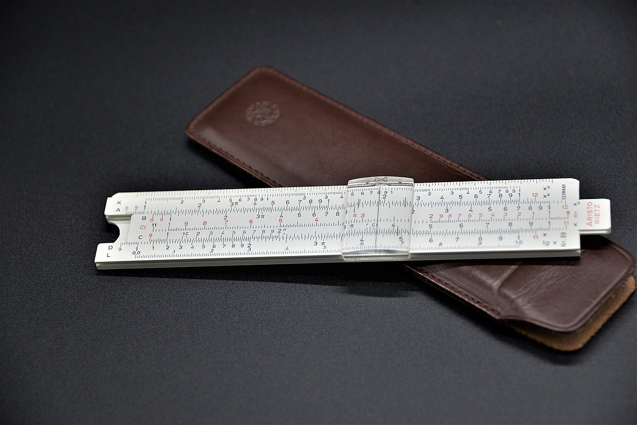 Slide rule, computing device, logarithmic — illustrating How Long Semaglutide and Tirzepatide Stay in Your System After the Last Dose