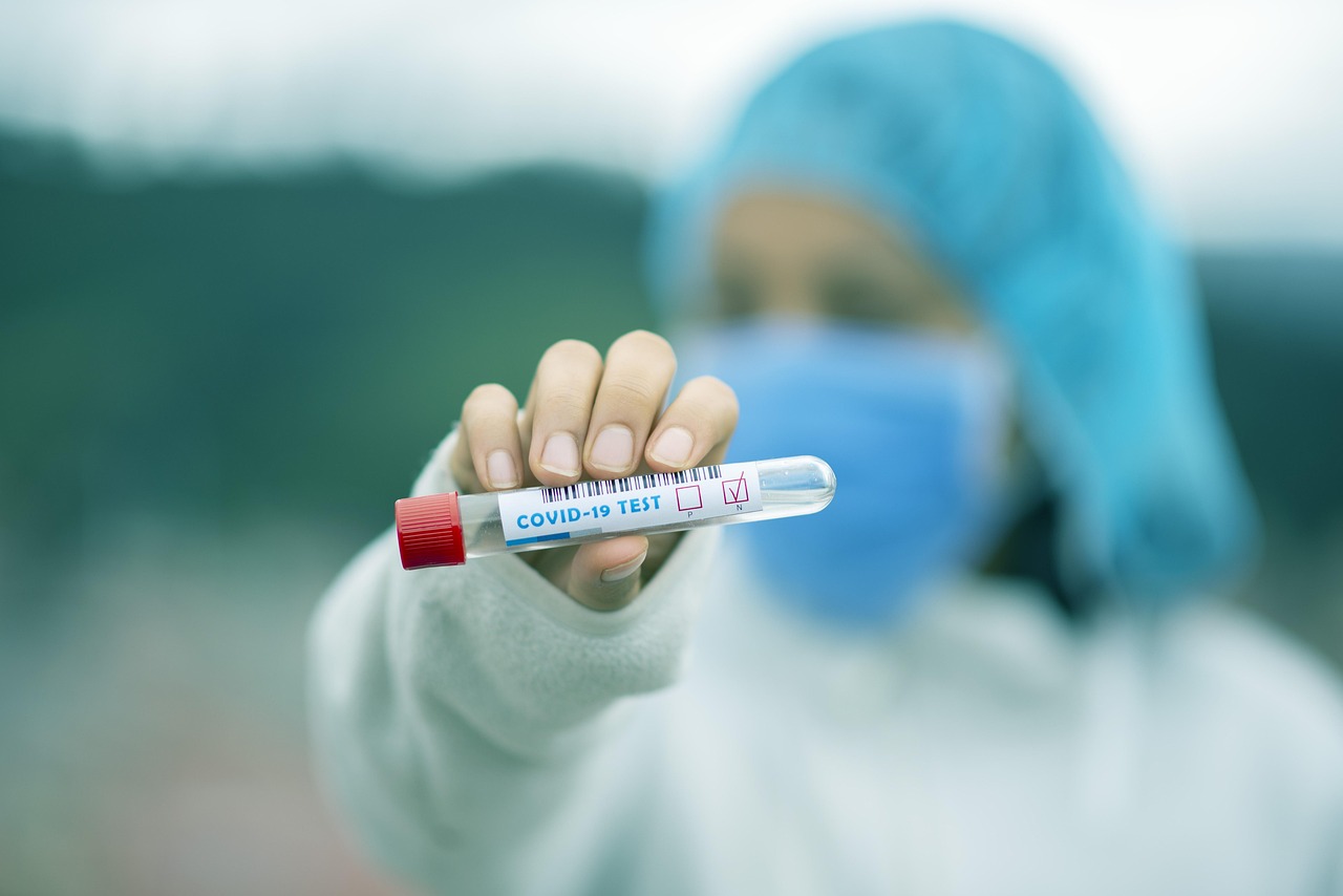 Test tube, covid-19, mask — illustrating Melanotan I vs Melanotan II: Comparing the Tanning Peptides