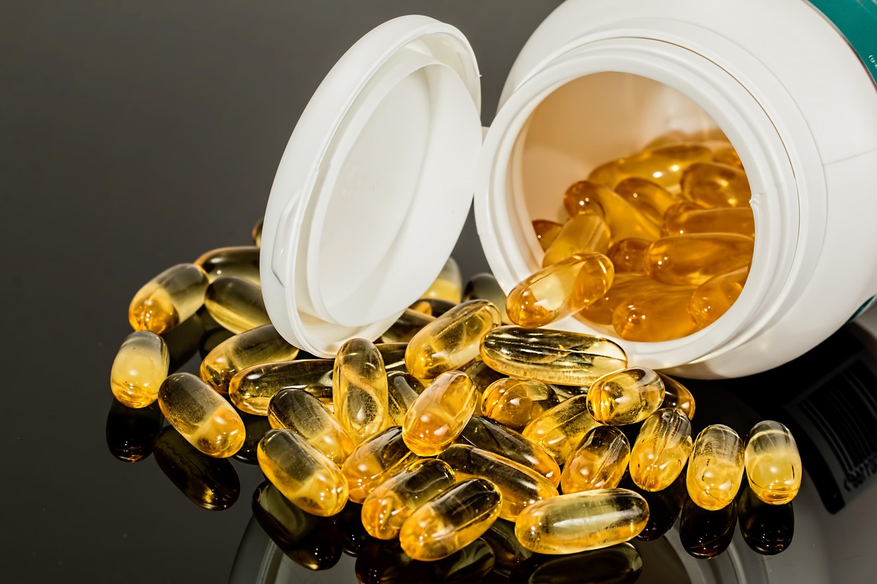 Capsules, pills, health — illustrating Omega-3s and Muscle Soreness
