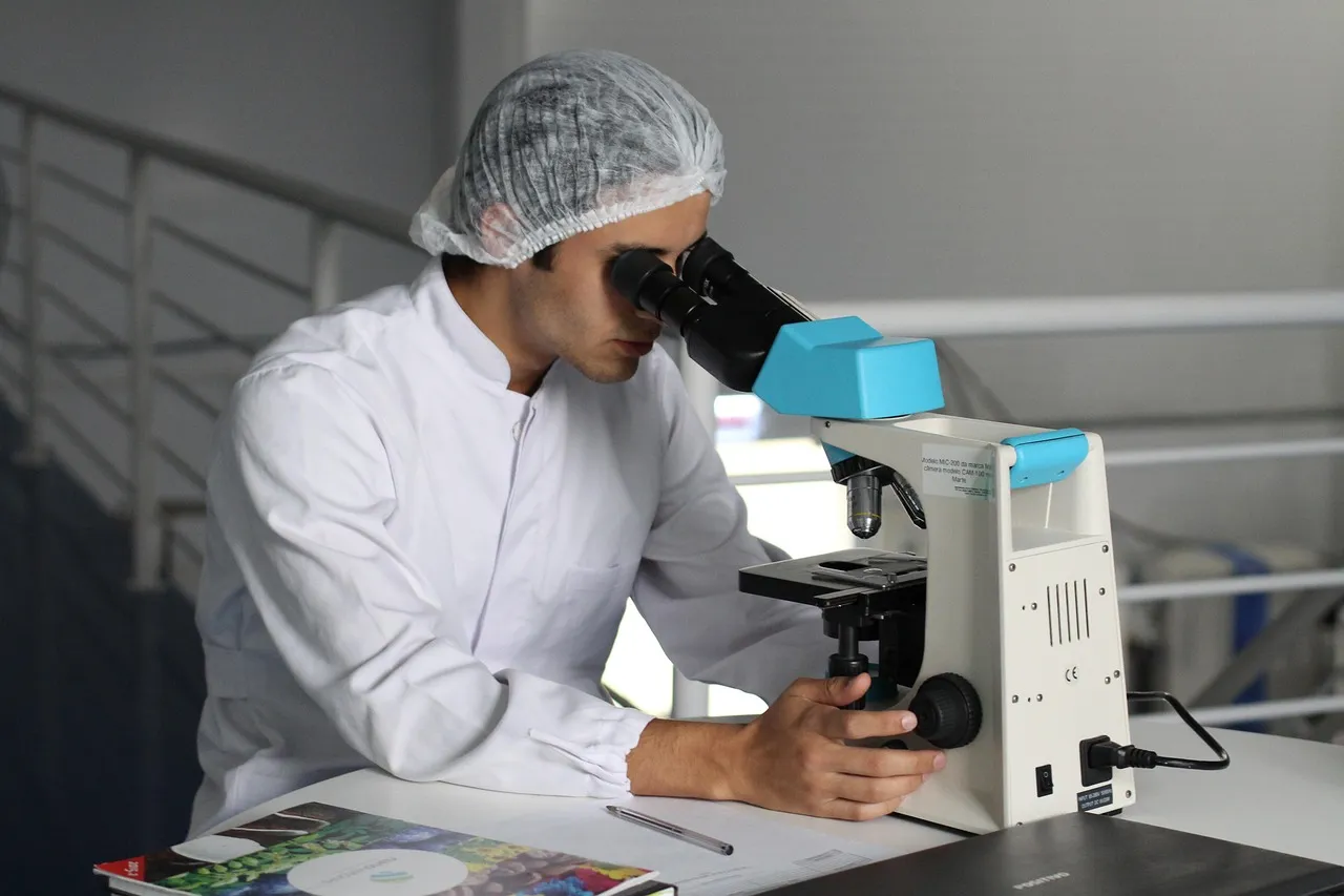 Scientist, drugstore, microscope — illustrating Peptide Vial Waste: Dead Space, Adsorption, and the Last Unusable Draw