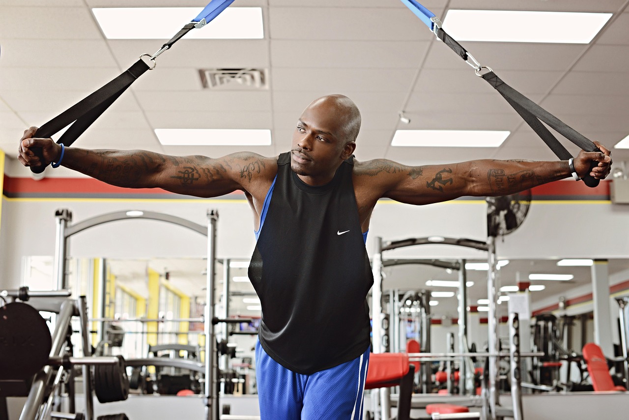 Fitness, personal trainer, guy — illustrating Recovery and Travel: Managing Jet Lag