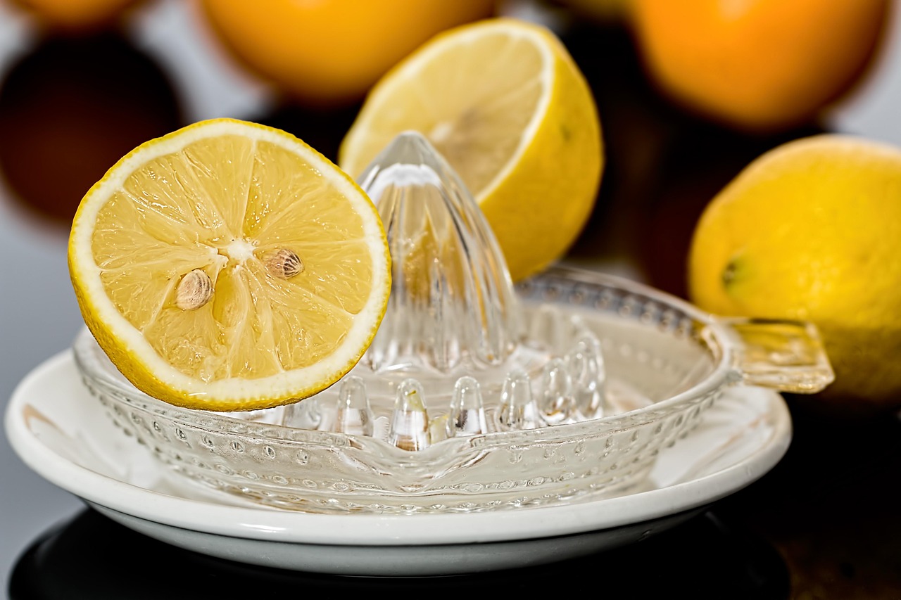Lemon squeezer, lemon juice, citrus — illustrating Retatrutide vs Tirzepatide: Triple vs Dual Agonist