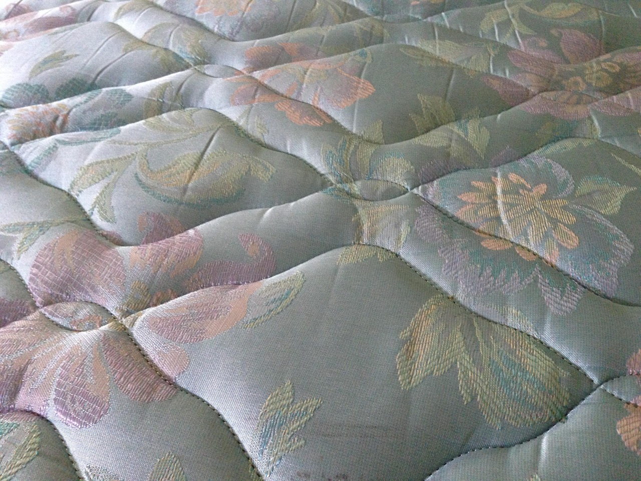 Mattress, bed, soft — illustrating Sleep and Muscle Recovery: What the Evidence Shows
