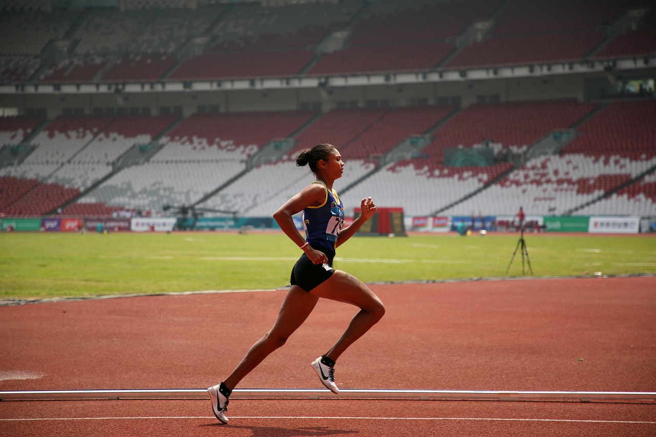 Woman, runner, sport — illustrating The Menstrual Cycle and Training Recovery