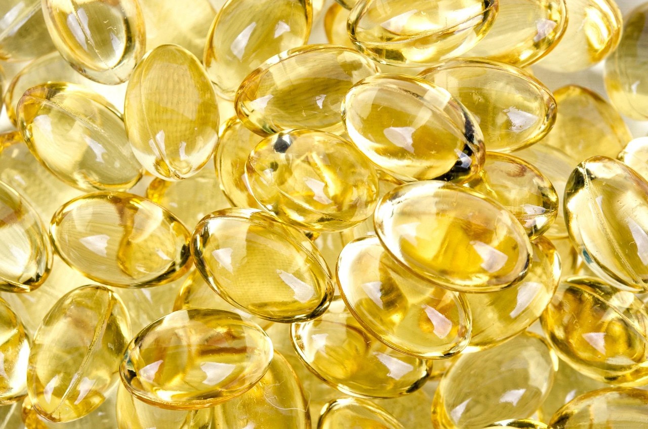 Pill, yellow, isolated — illustrating Vitamin D and Mortality: What Trials Show