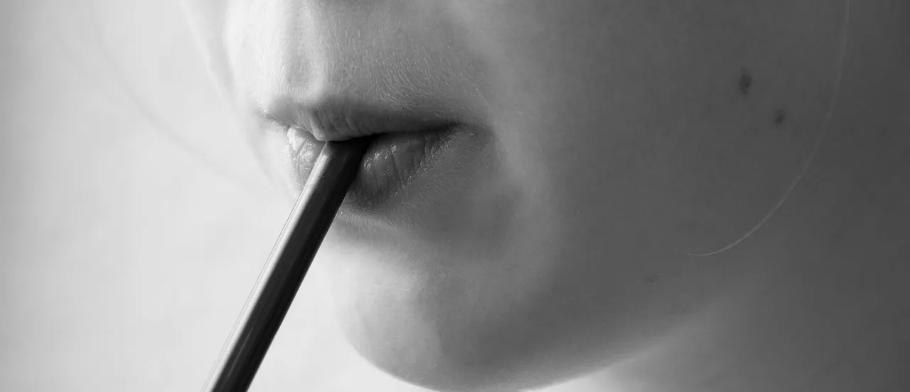 Drinking straw, drink, mouth — illustrating What a Peptide's Half-Life Actually Is (Plain-English Guide)