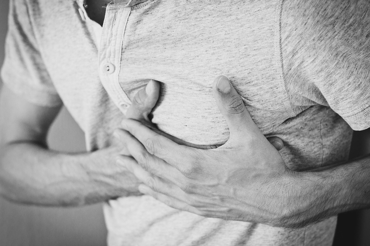 Man, heartache, chest pain — illustrating Growth-Hormone Peptides: A Complete Guide